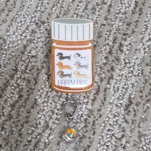 Orange Happy Pills Dachshund Badge Reel